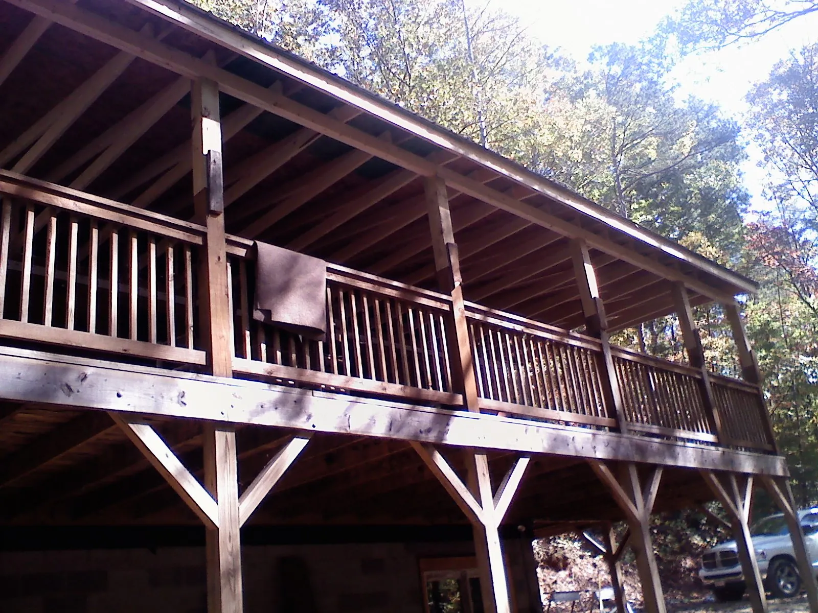 Timber framing under a new elevated porch and deck — Roof Leak Repair in Cantonment by Roofing Brothers